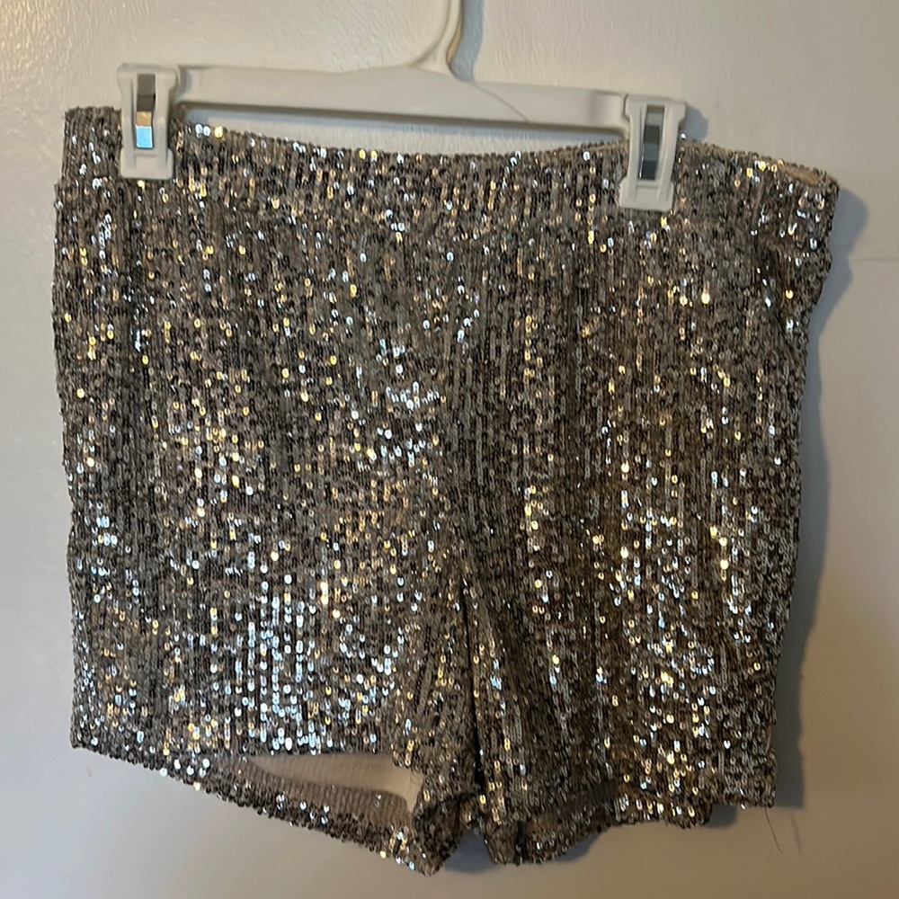 Size small sequin shorts.  Never worn
